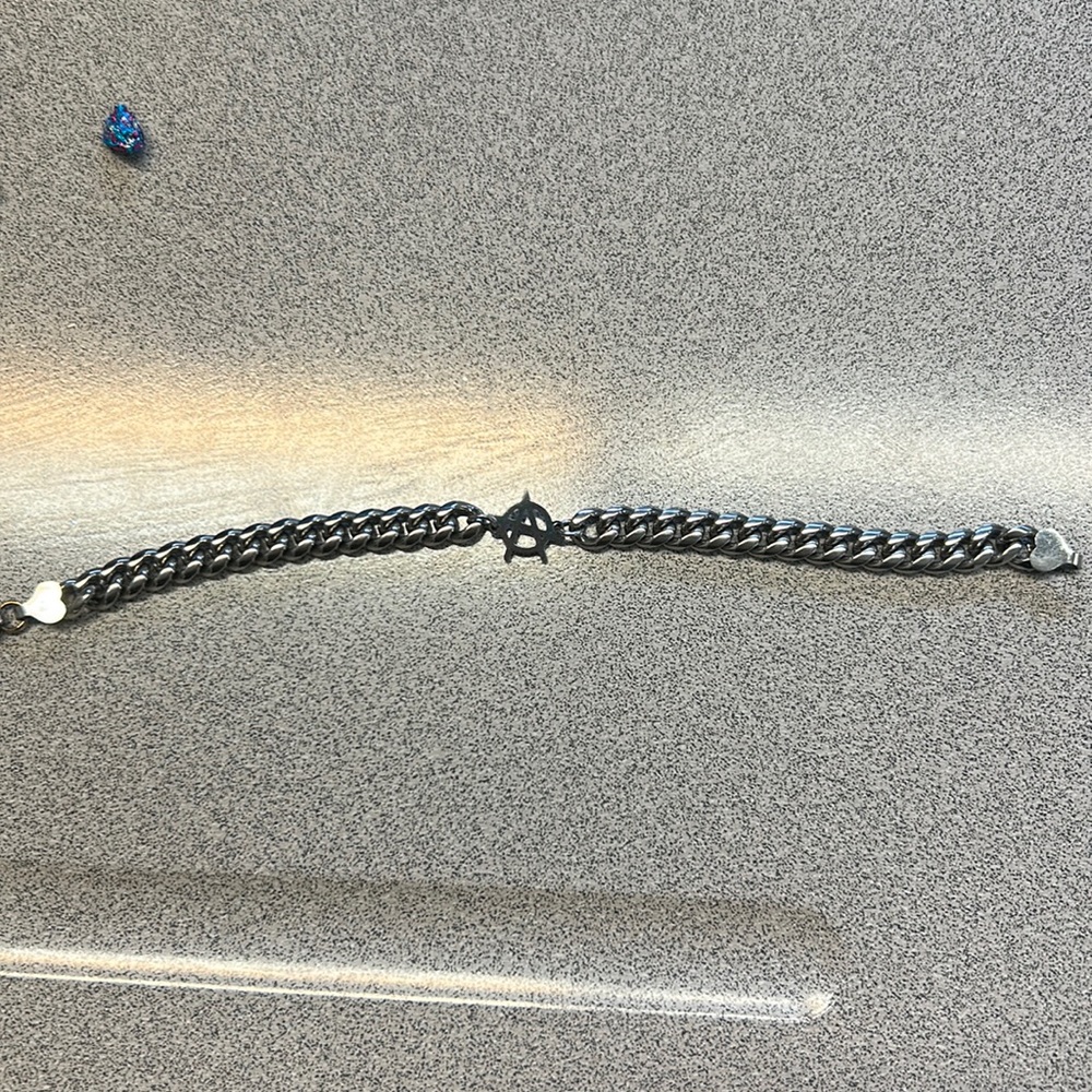 It’s a Hard jewelry anarchy bracelet.